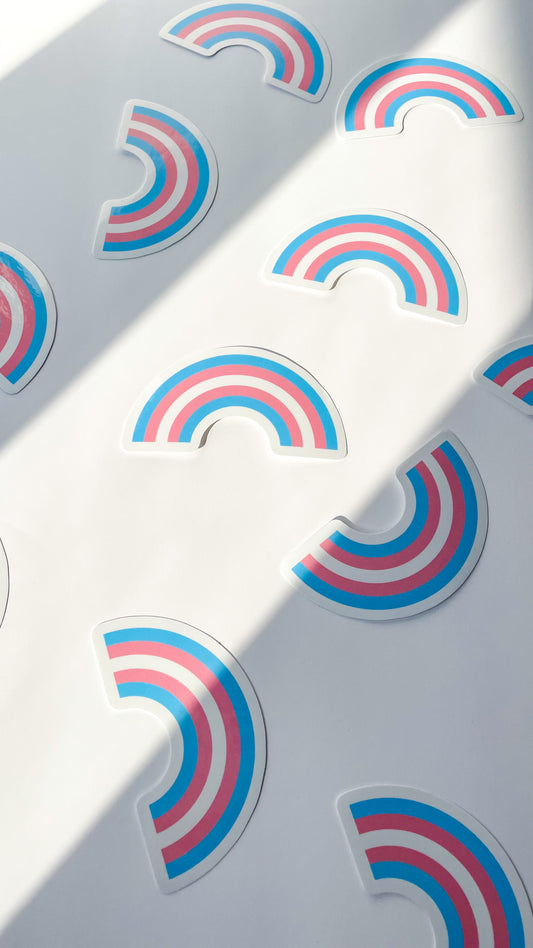 transgender pride flag in rainbow sticker shape