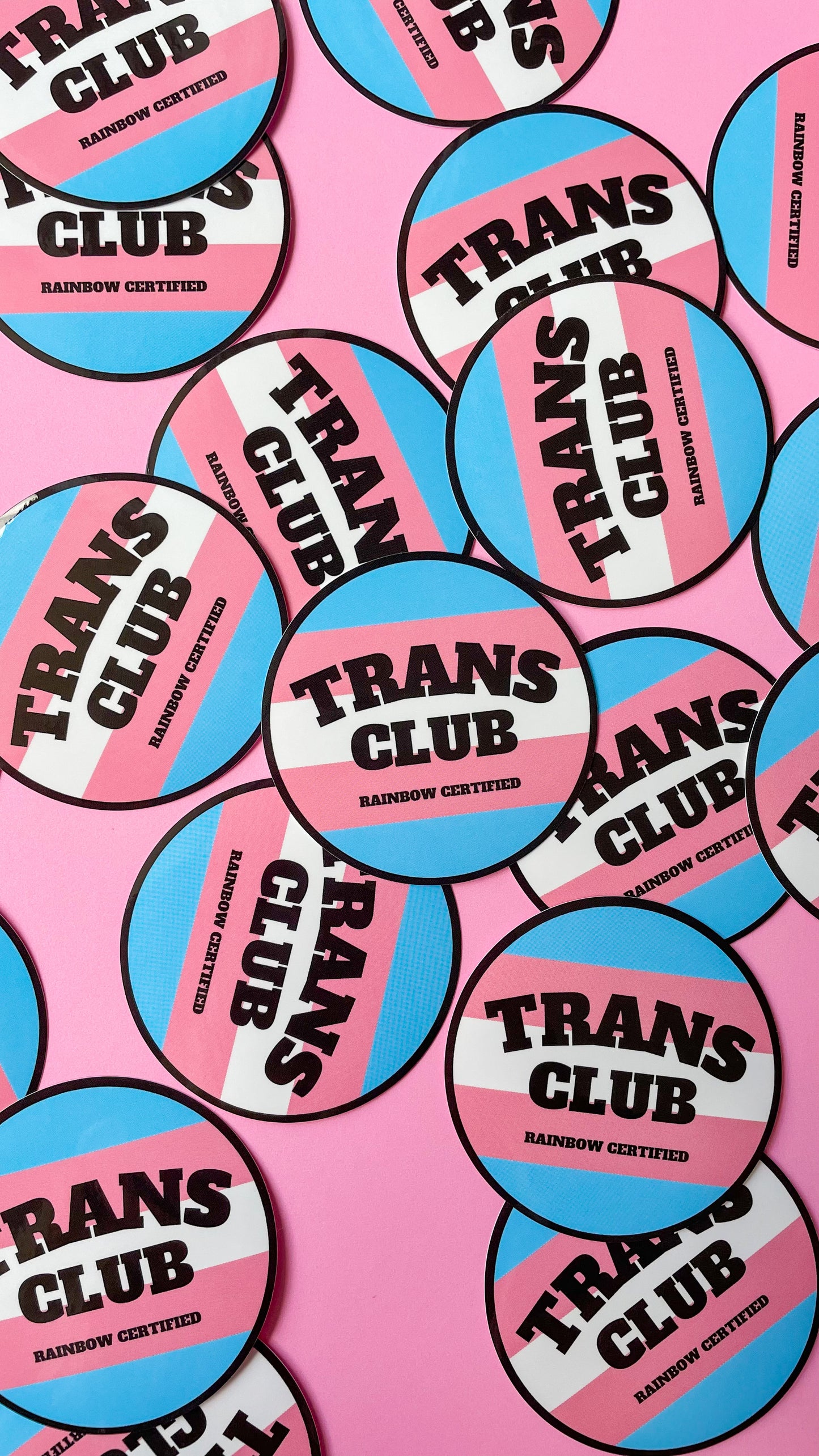 circle sticker that says trans club with Transgender pride flag