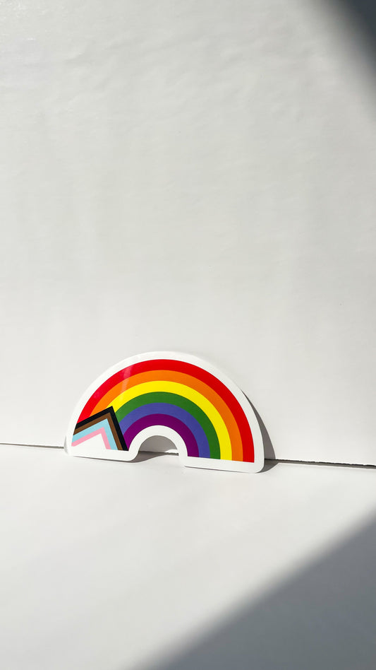 Progressive pride flag in rainbow sticker shape